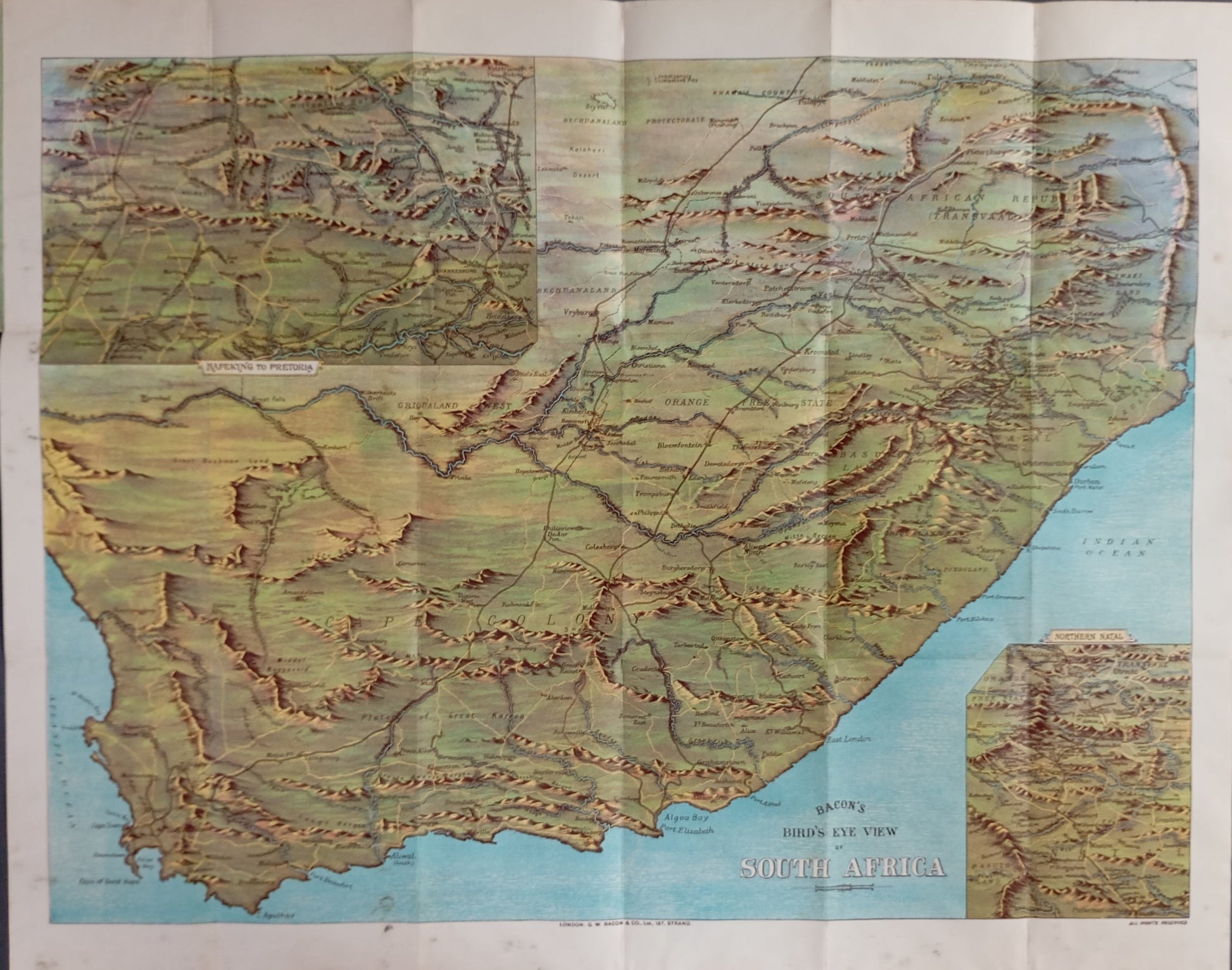 Carte ancienne de l'Afrique du Sud par Bacon's datant d'environ 1900, montrant le relief, les colonies historiques (Natal, Transvaal) et les villes principales.