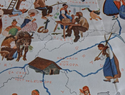 Gros plan sur la région des Grisons avec l'inscription « Ça c'est le toit de leur Europe » et l'image d'un chalet de montagne et d'une femme maniant une faux.