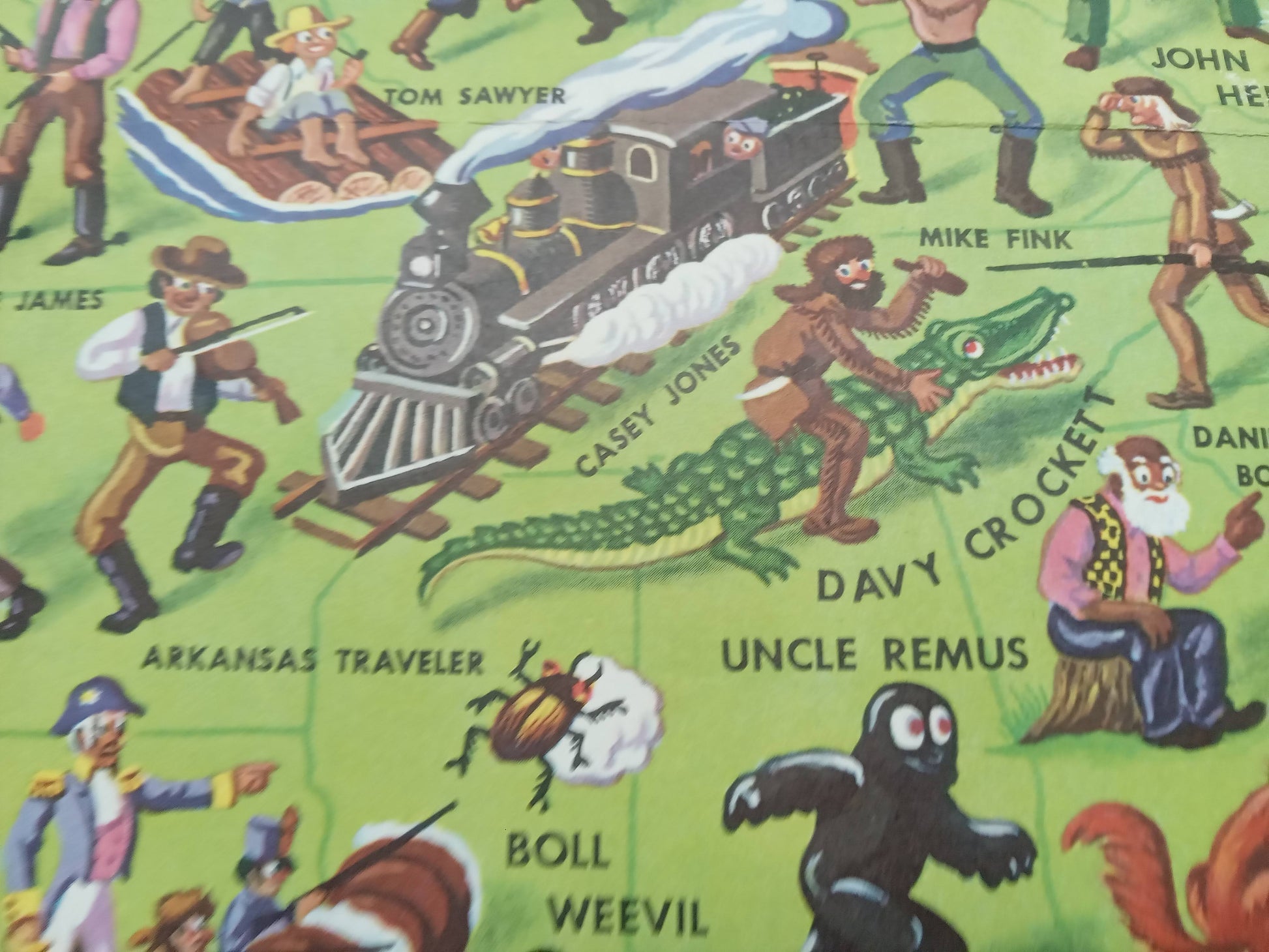 Carte picturale dépliante, vintage des contes et légendes américains, intitulée 'American Folklore & Legends', créée par John Dukes McKee vers 1950, illustrant une multitude de figures historiques, folkloriques et mythiques à travers les États-Unis