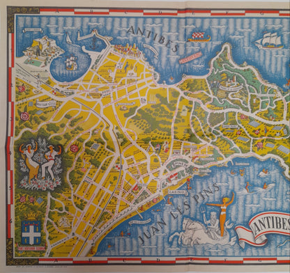  Détail du plan d'Antibes de Vic Raymon montrant une illustration de danseurs en costume provençal au milieu d'orangers, près du blason de la ville.