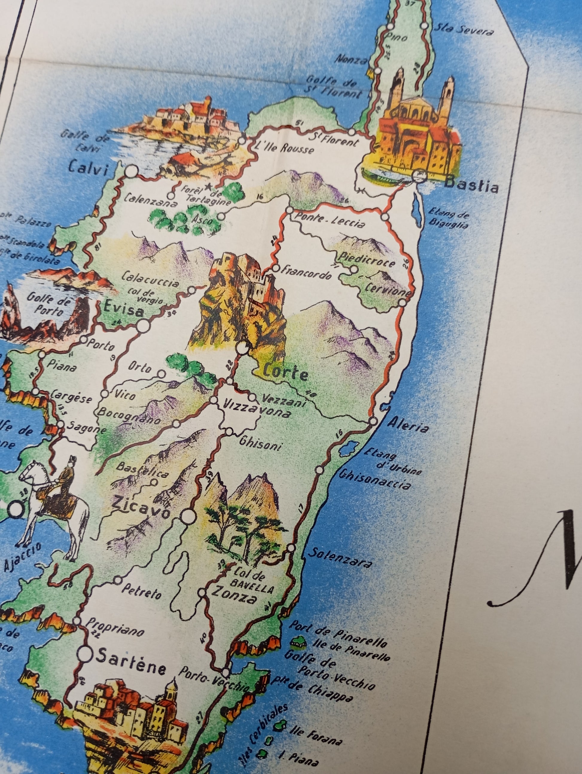 Zoom sur la corse de la carte géographique et illustrée ancienne de La Provence et la Corse, montrant les deux régions en couleurs sur un fond blanc, bordée par la Mer Méditerranée.