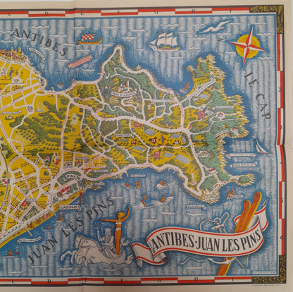 Zoom sur la partie de Juan-les-Pins du plan de 1949, avec l'illustration de Neptune sur son char, des baigneurs, et le bâtiment du Casino en bord de mer.