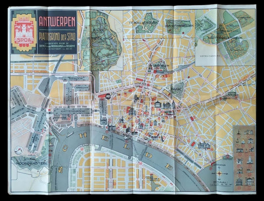 Plan complet d'Anvers en 1954 montrant le tracé des rues en jaune, le fleuve Escaut en bas et plusieurs encarts détaillant les parcs de la ville en haut.
