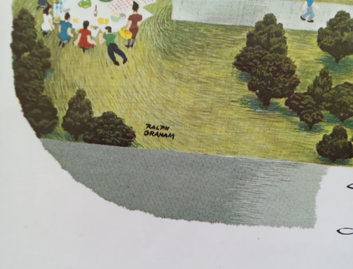 Très gros plan sur une zone de pelouse montrant un groupe de personnes en train de pique-niquer et la signature de l'artiste "Ralph Graham".