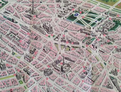 Détail du centre-ville montrant les îlots d'habitations en rose et les monuments historiques dessinés avec précision en noir et blanc, comme l'Hôtel de Ville et l'église Sainte-Gudule.